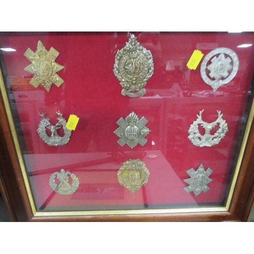 208 - An antique sword A/F together with a framed and glazed display of 9 military badges and two framed a... 