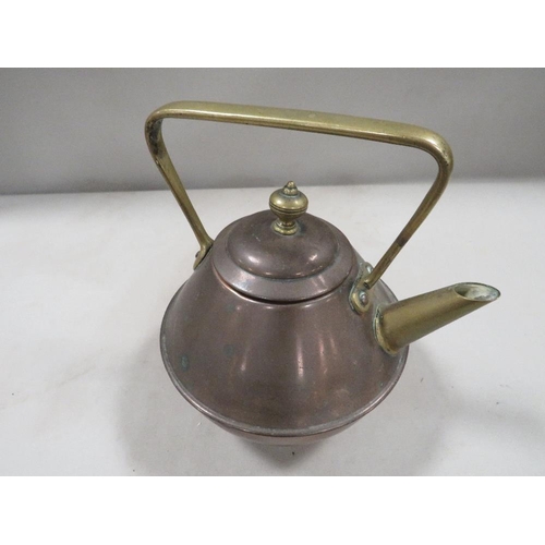 216 - An Arts & Crafts copper and brass kettle by Benham & Froud