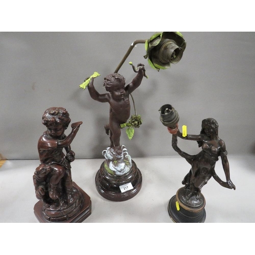 217 - A cast metal cherubic lamp A/F together with a bronze effect lamp base  and a cast metal figural lam... 