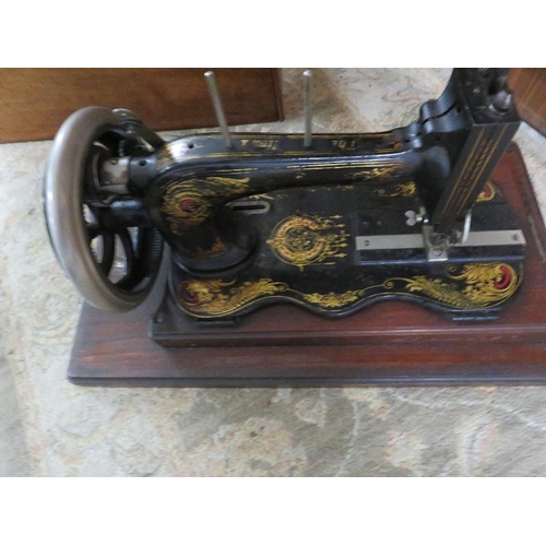 221 - An antique sewing machine