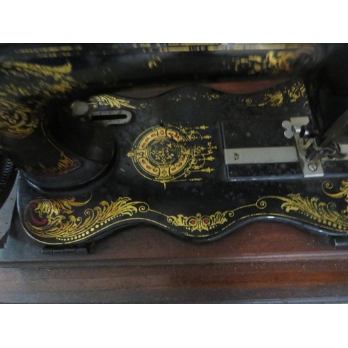 221 - An antique sewing machine