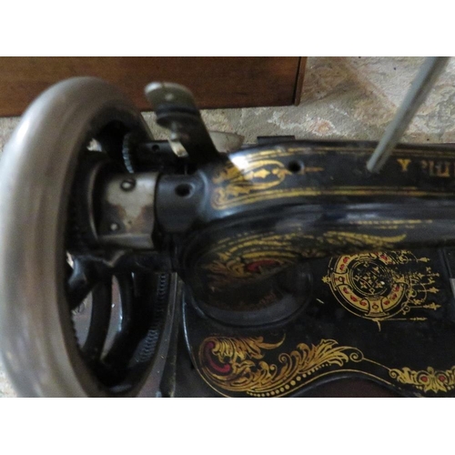 221 - An antique sewing machine