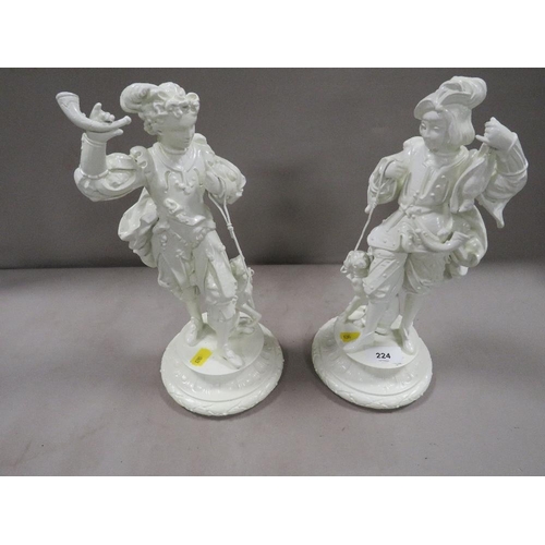 224 - A pair of cast figures overpainted in white