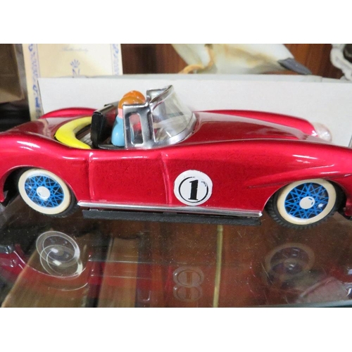 236 - A Japanese tin plate friction drive model car in original box together with a boxed Corgi Kojak CC00... 