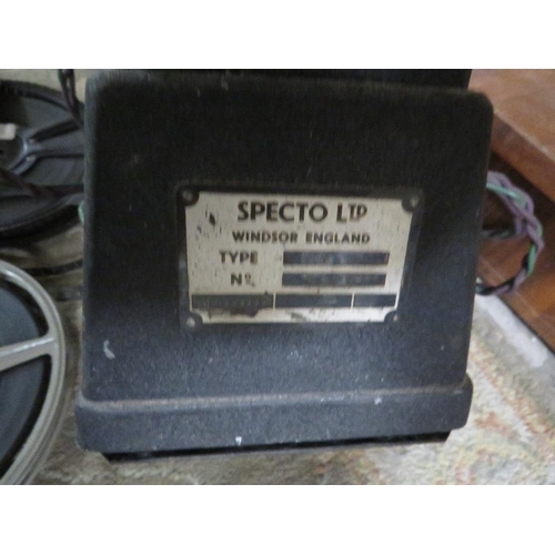 242 - A vintage Specto film projector and reels of film