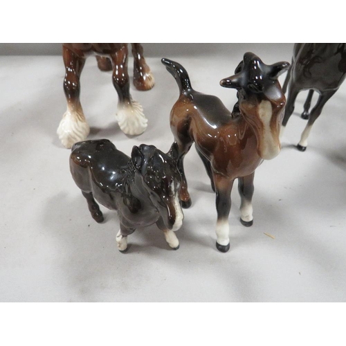 255 - A collection of five Beswick horses to include a cantering shire