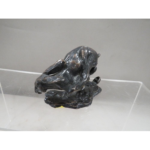 276 - A small cold bronze cast figure of a running hare