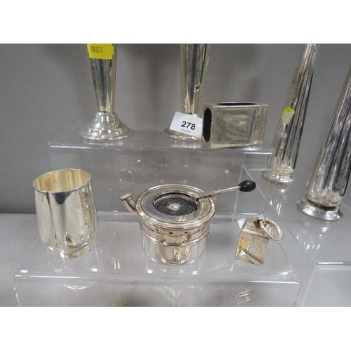 278 - A small collection of stylized silver plated ware to include small graduated weights together with a... 