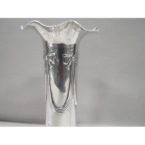 283 - An Edwardian style with bow and swag  hallmarked silver specimen vase 