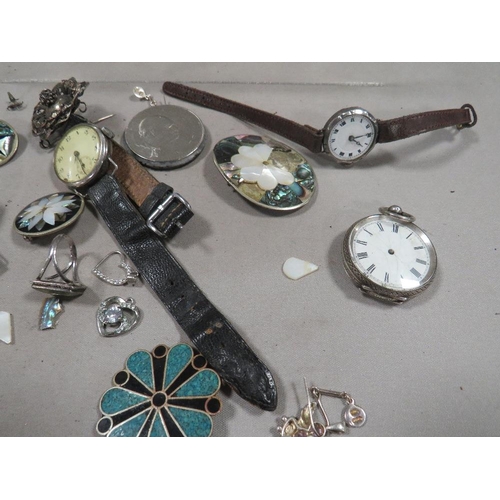 285 - A bag of assorted sundries to include watches, brooches etc to include silver examples