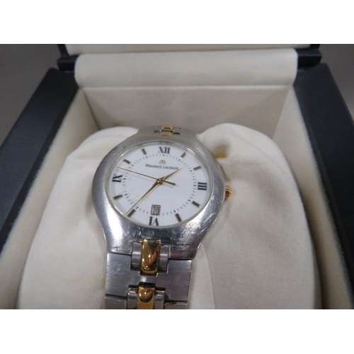 299 - A Maurice Lacroix wrist watch together with box and paper work with guarantee dated 2000