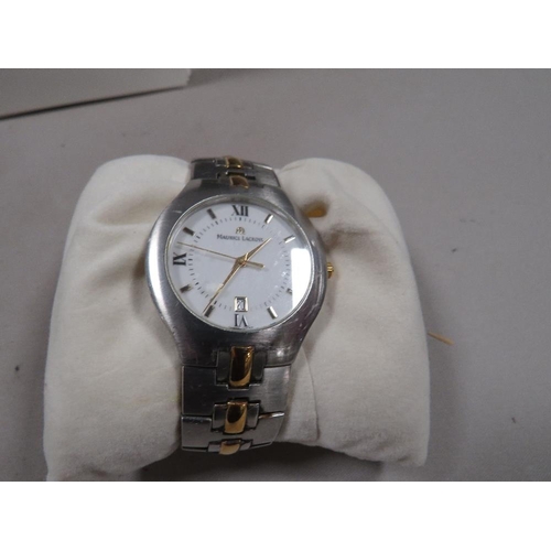 299 - A Maurice Lacroix wrist watch together with box and paper work with guarantee dated 2000