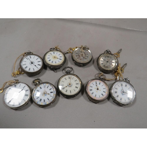 311 - Nine Victorian silver cased pocket watches and keys