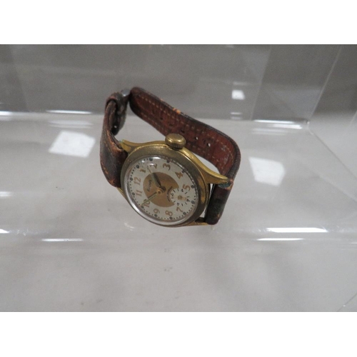 312 - A vintage 'Aircraft' watch on a vintage leather strap with 'Rolex' logo