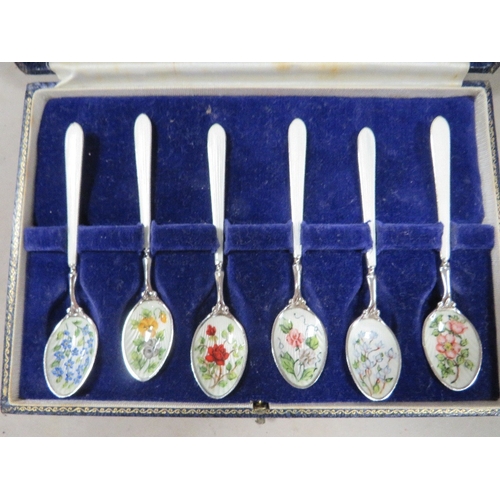 324 - A set of six hallmarked silver enamel floral pattern spoons