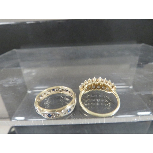 341 - A hallmarked 9ct gold dress ring and 9ct gold & silver eternity ring, both size O, total weight appr... 