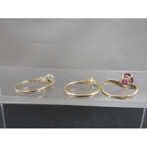 348 - Three hallmarked 9ct gold dress rings, all size L, total weight approx 4.9 g