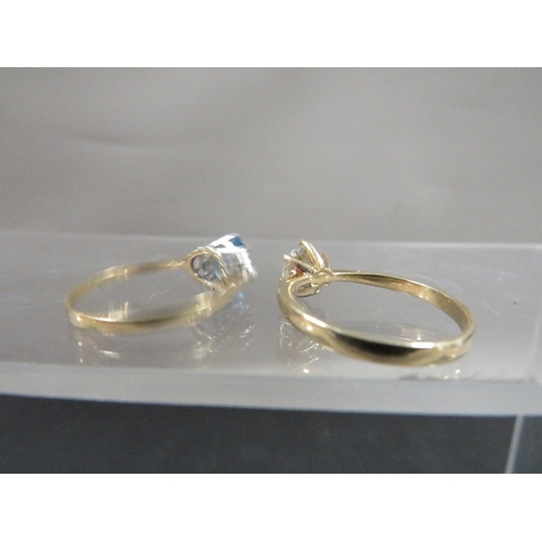 349 - Two hallmarked 9ct gold dress rings, both size O, total weight approx. 3.7 g