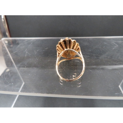 385 - A hallmarked 9 carat gold dress ring set with a smoky quartz approx. weight 7.4g