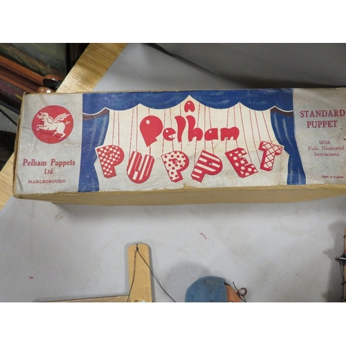 421 - A vintage boxed Pelham puppet plus another