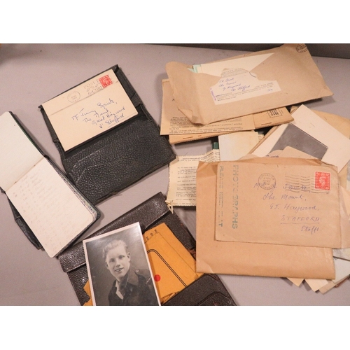 430 - A tray of ephemera to include a soldiers service and pay book etc