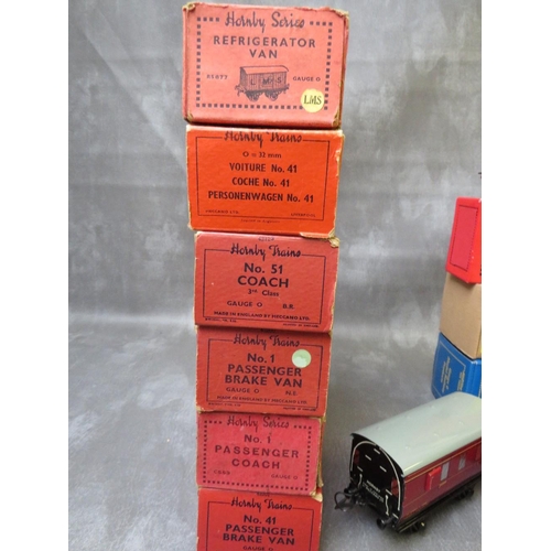 113 - SIXTEEN BOXED MAINLY HORNBY O GAUGES PIECES OF ROLLING STOCK, to include guards van, passenger coach... 