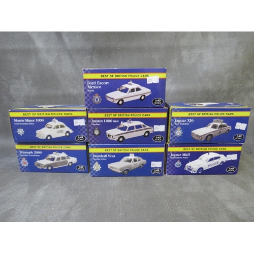 122 - SEVEN BOXED 1:43 SCALE BEST OF BRITISH POLICE CARS, to include Ford Escort Mexico, Morris Minor 1000... 