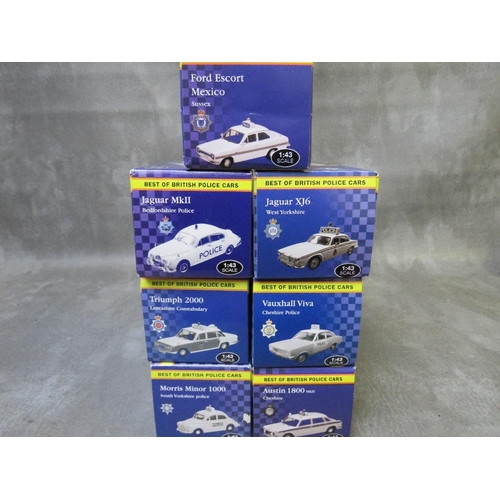 122 - SEVEN BOXED 1:43 SCALE BEST OF BRITISH POLICE CARS, to include Ford Escort Mexico, Morris Minor 1000... 