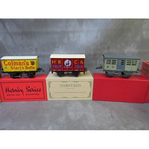 126 - TWENTY TWO BOXED O GAUGE MAINLY HORNBY PIECES OF ROLLING STOCK, to include brake van Pullman coach, ... 