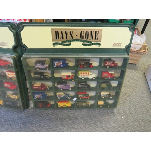 128 - FOUR DAYS GONE CAR WALL SHELVES, each containing twenty die cast vehicles