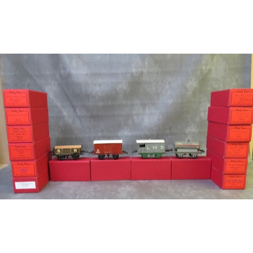 131 - SIXTEEN BOXED HORNBY O GAUGE ROLLING STOCK, to include tankers, covered and uncovered wagons