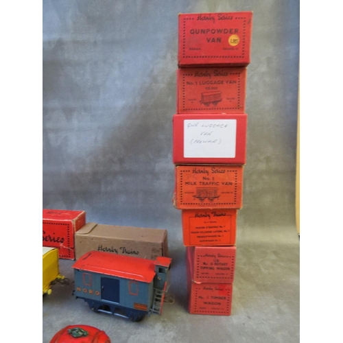 132 - LARGE BOX CONTAINING TWENTY HORNBY O GAUGE BOXED ROLLING STOCK, to include luggage van, gunpowder va... 