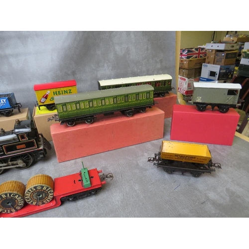 149 - O GAUGE JOB LOT, to include unboxed Jupiter locomotive 1902, seven boxed carriages / rolling stock, ... 