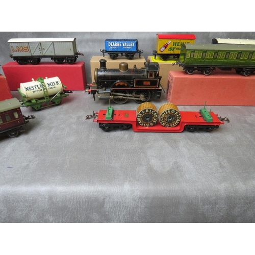 149 - O GAUGE JOB LOT, to include unboxed Jupiter locomotive 1902, seven boxed carriages / rolling stock, ... 