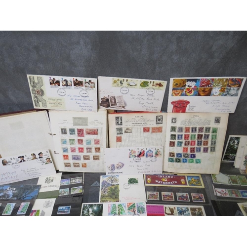 159 - THREE STAMP ALBUMS CONTAINING WORLD STAMPS, together with a collection of first day covers mainly 19... 