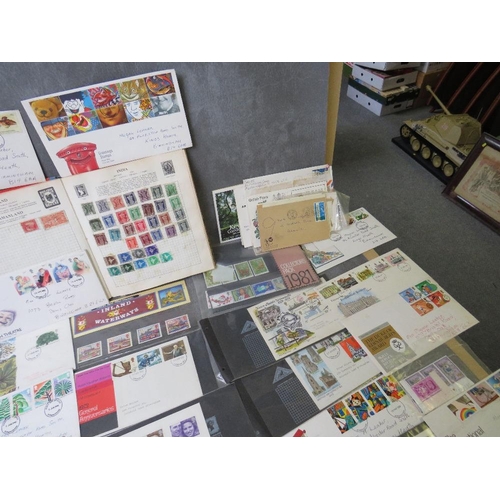 159 - THREE STAMP ALBUMS CONTAINING WORLD STAMPS, together with a collection of first day covers mainly 19... 