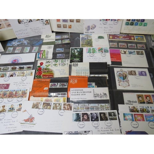 159 - THREE STAMP ALBUMS CONTAINING WORLD STAMPS, together with a collection of first day covers mainly 19... 