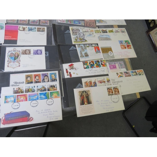 159 - THREE STAMP ALBUMS CONTAINING WORLD STAMPS, together with a collection of first day covers mainly 19... 