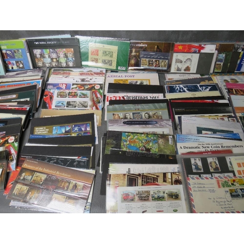 31 - A TRAY OF STAMP PRESENTATION PACKS