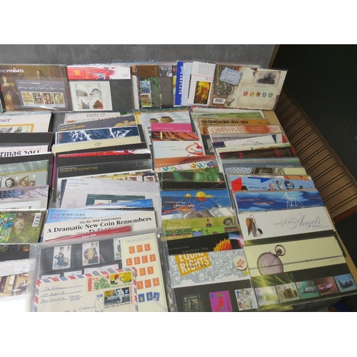 31 - A TRAY OF STAMP PRESENTATION PACKS