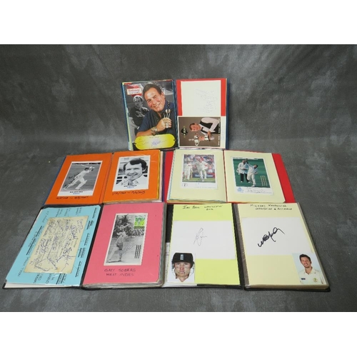 33 - FOUR ALBUMS CONTAINING PICTURES, CARDS, CUTTINGS SIGNED BY CRICKETERS, to include Gary Sobers, Darre... 