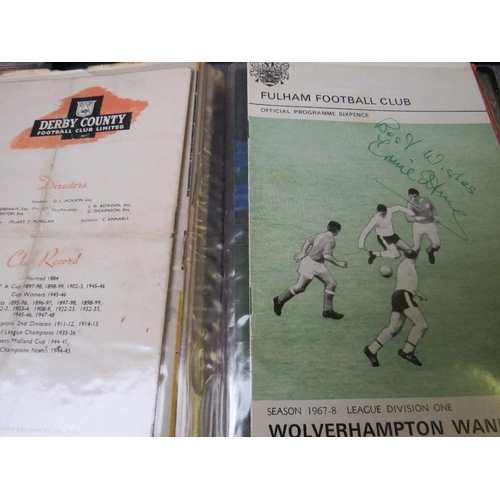 35 - FIVE ALBUMS CONTAINING VINTAGE FOOTBALL PROGRAMMES, some from the late 1950s, some autographed, sign... 