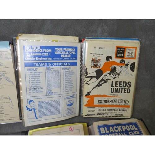 35 - FIVE ALBUMS CONTAINING VINTAGE FOOTBALL PROGRAMMES, some from the late 1950s, some autographed, sign... 