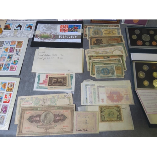 41 - A COLLECTION OF COINS, BANK NOTES AND STAMPS, to include proof sets 1971, 1980, 1982, 1993, 1194 etc