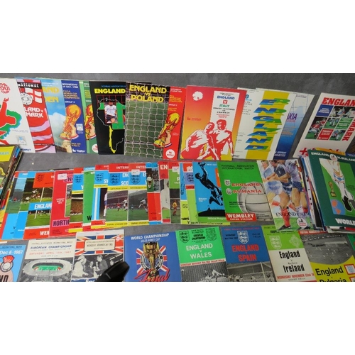 44 - A COLLECTION OF OVER ONE HUNDRED ENGLAND FOOTBALL PROGRAMMES THROGUH THE YEARS, form 1966 to the eal... 