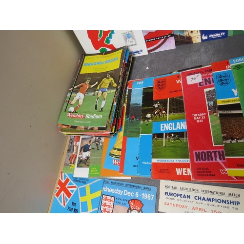 44 - A COLLECTION OF OVER ONE HUNDRED ENGLAND FOOTBALL PROGRAMMES THROGUH THE YEARS, form 1966 to the eal... 