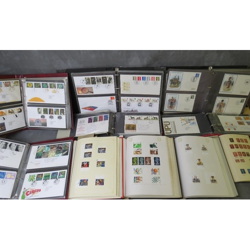 53 - SIX FIRST DAY COVER ALBUMS, together with four British stamp albums, one of which contains many Vict... 