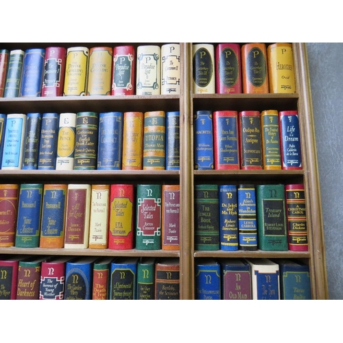 66 - A MINIATURE WOODEN BOOKCASE CONTAINING SEVENTY FOUR MINIATURE CLASSIC DEL PRADO LIBRARY HARDBACK BOO... 