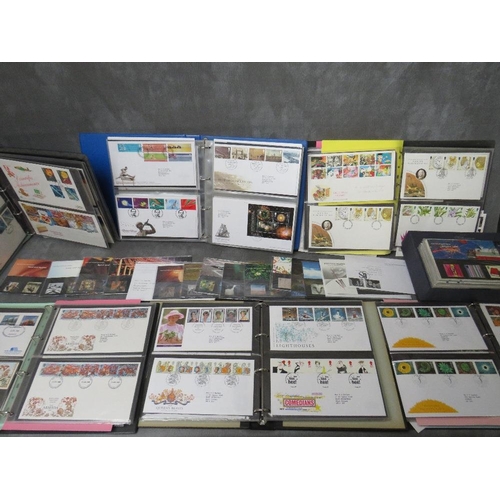 74 - SIX ALBUMS OF FIRST DAY COVERS, mainly 1980s / 1990s, together with a Royal Mail Millenium collectio... 