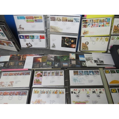 74 - SIX ALBUMS OF FIRST DAY COVERS, mainly 1980s / 1990s, together with a Royal Mail Millenium collectio... 